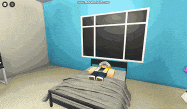 a person is laying on a bed in front of a window with the website www.bandicam.com at the bottom