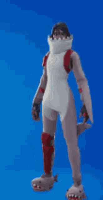 a person wearing a shark costume and slippers is standing on a blue background .