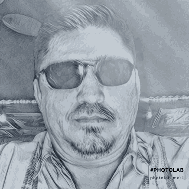 a drawing of a man 's face with a broken glass behind him