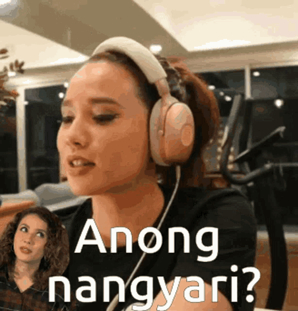 a woman wearing headphones with the words anong nangyari on the bottom