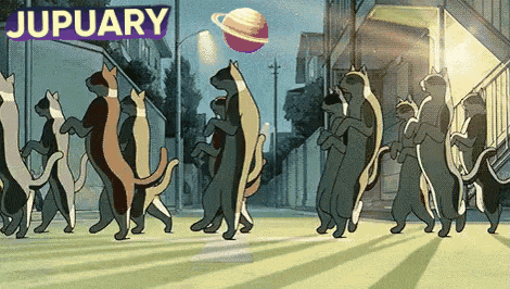 a group of cats are walking down a street with a sign that says jupuary above them