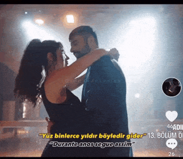 a man and a woman are dancing with a caption that says " yüz binlerce yıldır boyledir gider "