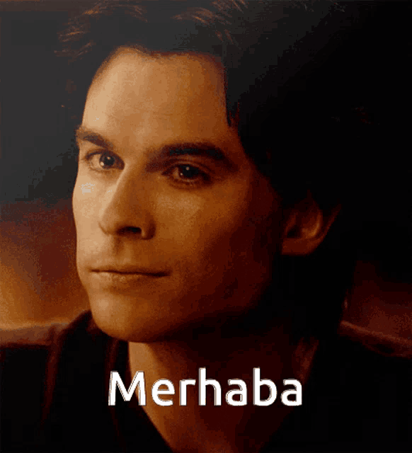 a close up of a man 's face with the name merhaba written below him