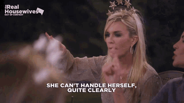 a screenshot of a real housewives show with two women