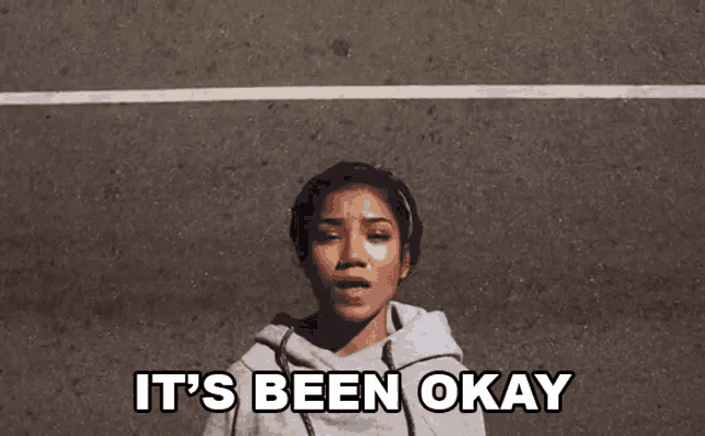 a woman says it 's been okay while standing on the street