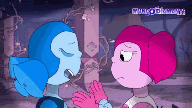 a blue and pink cartoon character standing next to each other with the words mundo diamant on the bottom right