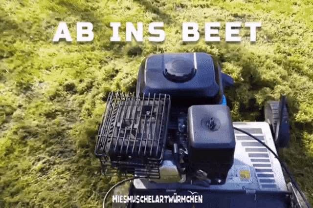 a picture of a lawn mower with the words ab ins beet above it