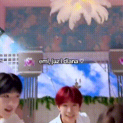 a group of people are sitting in front of a wall with a flower and the words emi jaz diana on it