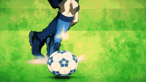 a soccer player kicking a soccer ball on a green field