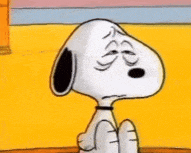 a cartoon of snoopy with a mohawk making a funny face .