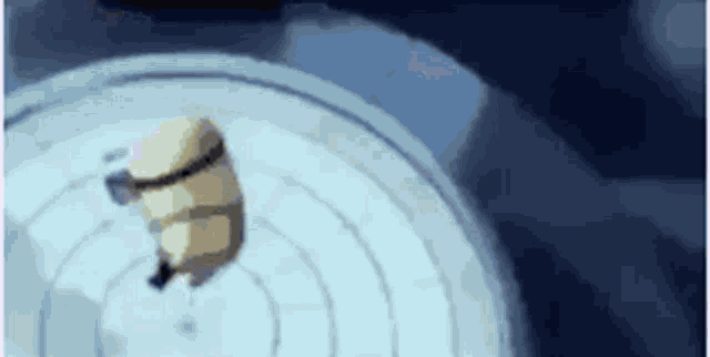 a cartoon character is flying through the air in a room .