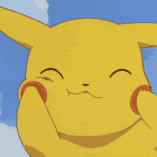 a close up of a pikachu 's face with its eyes closed