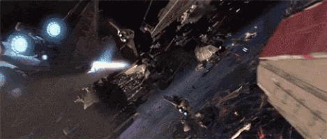 a group of fighter jets are flying through space in a battle .