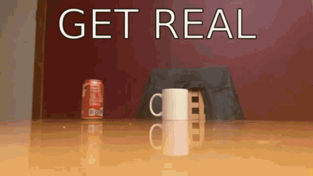a can of coca cola and a cup on a table with the words get real behind them