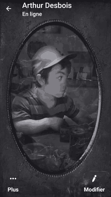 a black and white photo of a boy with the name arthur desbois