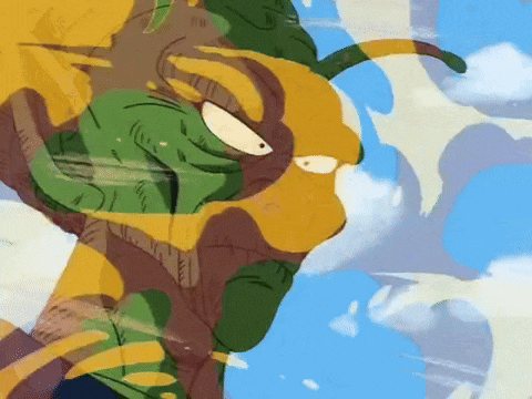 a close up of a cartoon character with a yellow and green face
