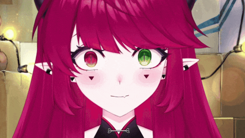 a girl with red hair and green eyes is making a funny face