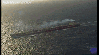 an aerial view of a large ship in the ocean with topgear.com written on the bottom right
