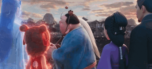 a group of cartoon characters are standing next to each other in front of a mountain .