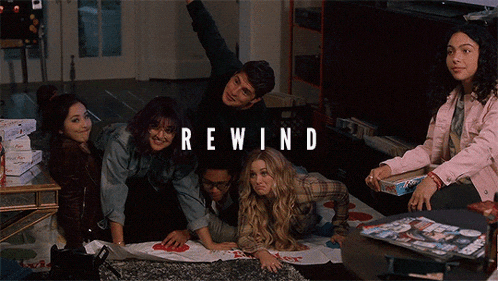 a group of people are laying on the floor with the word rewind written above them