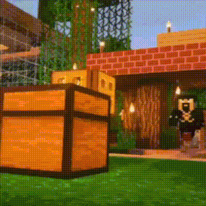 a wooden chest is sitting on top of a lush green field in a video game .