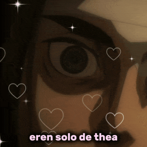 a close up of a person 's eye with hearts around it and the words eren solo de thea
