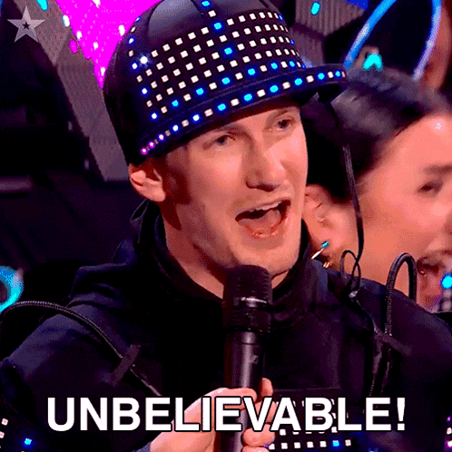 a man wearing a hat and holding a microphone with the word unbelievable below him