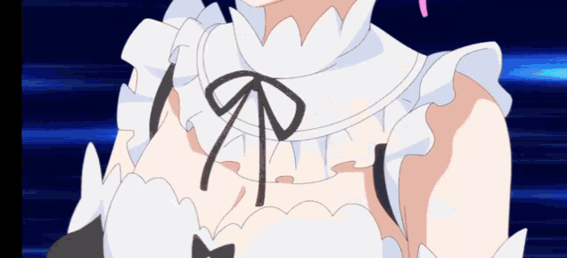a close up of a woman 's chest with a bow