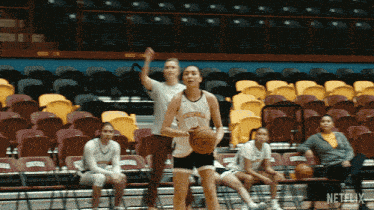 a netflix ad shows a basketball game being played in a stadium