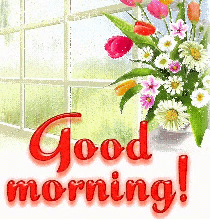 a bouquet of flowers in front of a window with the words " good morning "