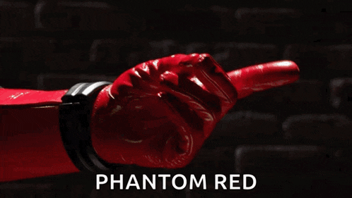 a wanted poster on a brick wall with the word phantom red below it