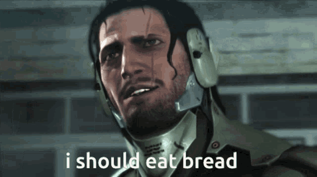 a man wearing a helmet and headphones says i should eat bread