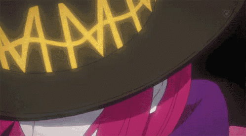a close up of a person wearing a black hat that says aaa