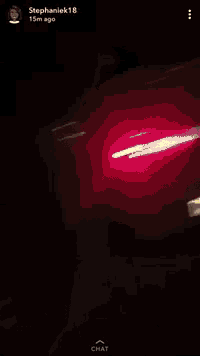 a blurry picture of a man standing in front of a car with stephaniek18 15m ago on the bottom
