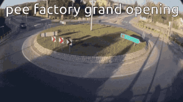 a roundabout with the words pee factory grand opening on the bottom