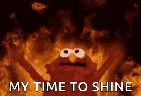 elmo is on fire with the words " my time to shine " above him