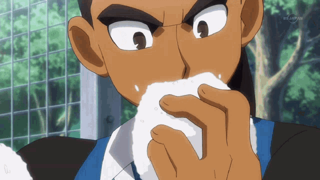 a cartoon of a man eating a rice ball with a bs japan logo behind him