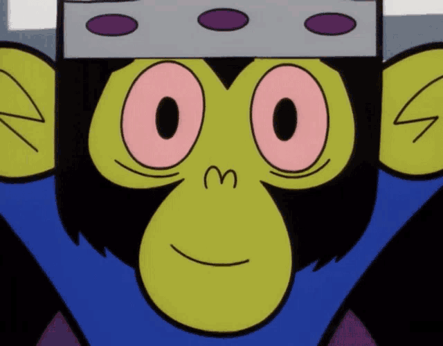 a close up of a cartoon character with the letter m on its face