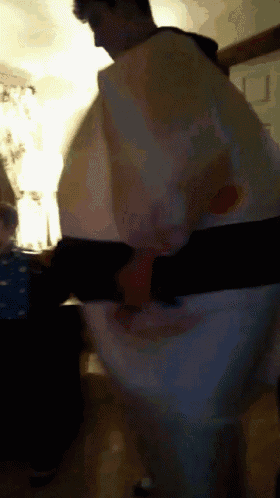 a man is wearing a costume that looks like a balloon