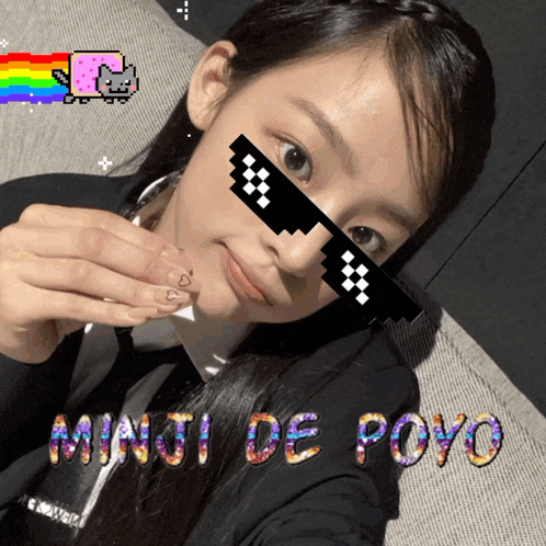 a girl wearing sunglasses with the words " minui de poyo " on her face
