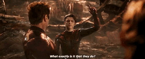 a man in a spiderman suit is asking another man what exactly is it that they do ?