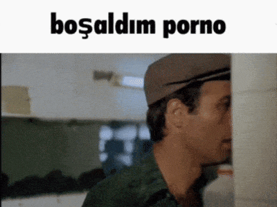 a man in a hat is peeking out from behind a wall with the words bosaldm porno written above him