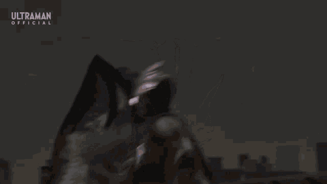 a monster from ultraman is shooting a blue beam of light