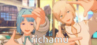 two anime characters are making a frame with their hands and the word richamu is on the bottom .