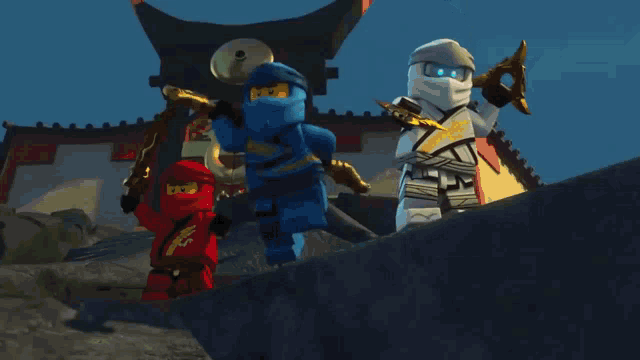a lego ninjago character is jumping in the air while holding a sword .