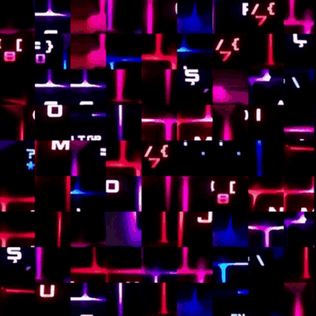 a computer keyboard with a grid of keys including the letters m and t