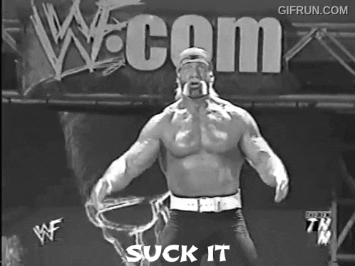 a black and white photo of a wrestler with the words suck it in white letters