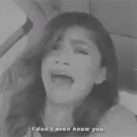 a black and white photo of a woman with her mouth open and the words i don 't even know you written below her .