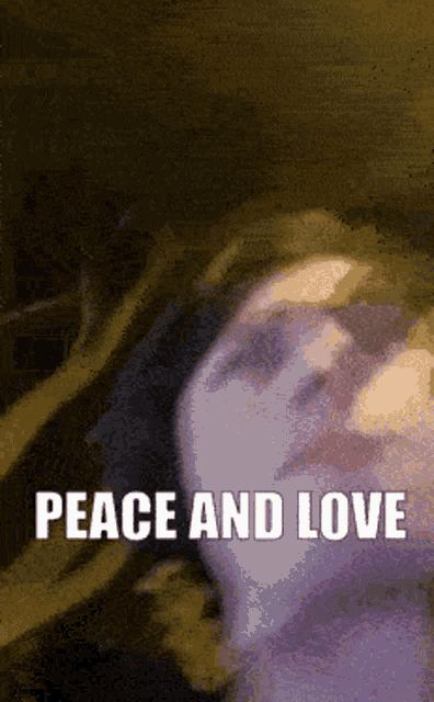 a blurred image of a person with the words peace and love on the bottom
