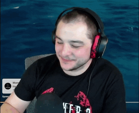 a man wearing headphones and a t-shirt that says ' a few ' on it